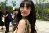 Nữ TikToker diện đầm tông màu trung tính trên thuyền