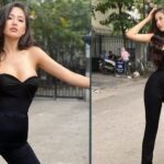 Mai Phương Thúy tạo dáng trong bộ trang phục đen giữa không gian đời thường