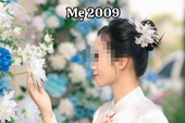 Mizuki diện áo ren trắng cùng quần short họa tiết xanh
