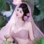 Mai Linh tạo dáng giữa những tàu lá sen trong trang phục hồng pastel