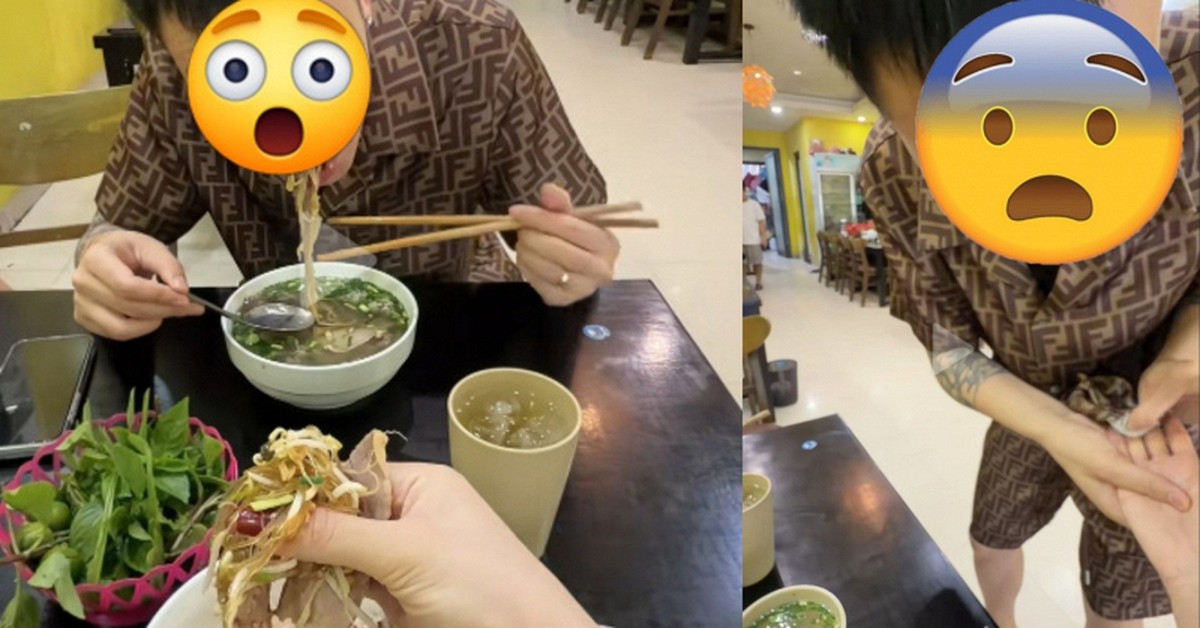 Cặp đôi ngồi dùng bữa tại một quán ăn bình dân