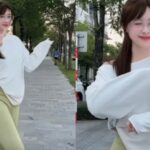 Mai Ngọc thực hiện động tác khởi động trước buổi chạy bộ