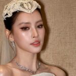 Tiểu Vy xuất hiện trên sàn diễn thời trang trong hình tượng cô dâu