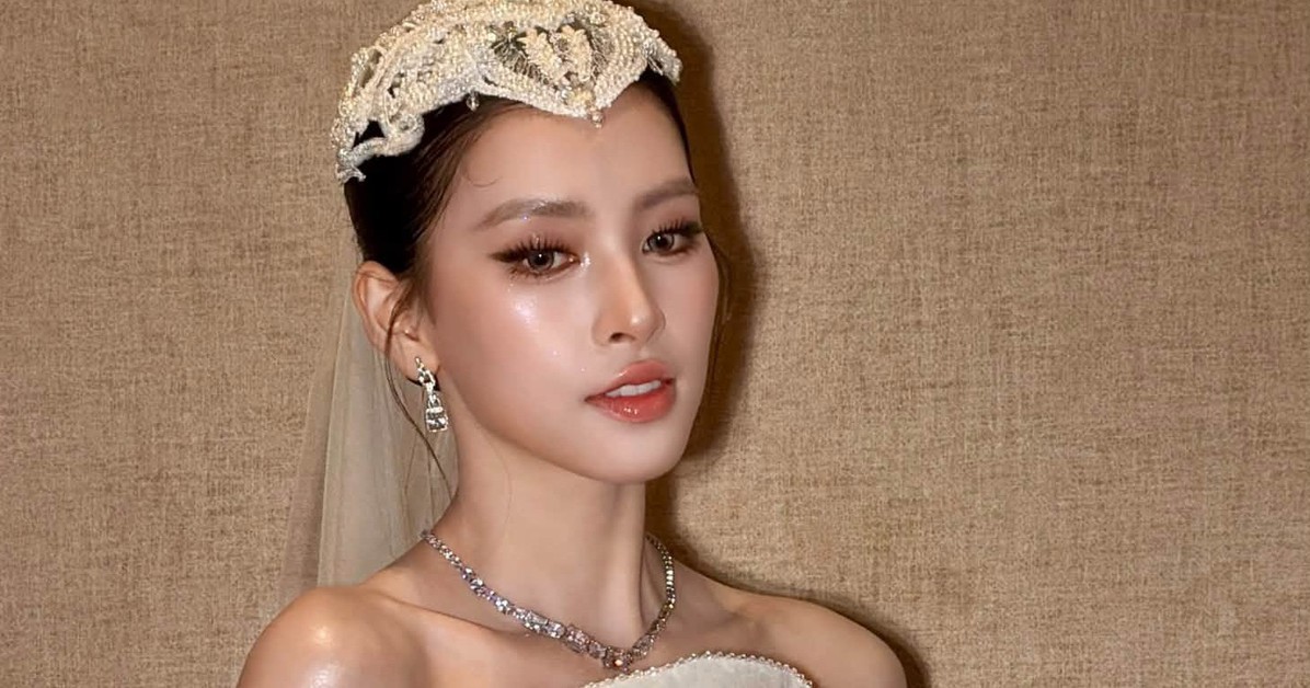 Tiểu Vy xuất hiện trên sàn diễn thời trang trong hình tượng cô dâu